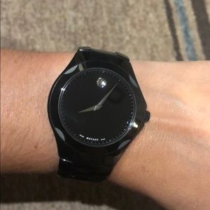 Authentic unisex all black Movado watch.
